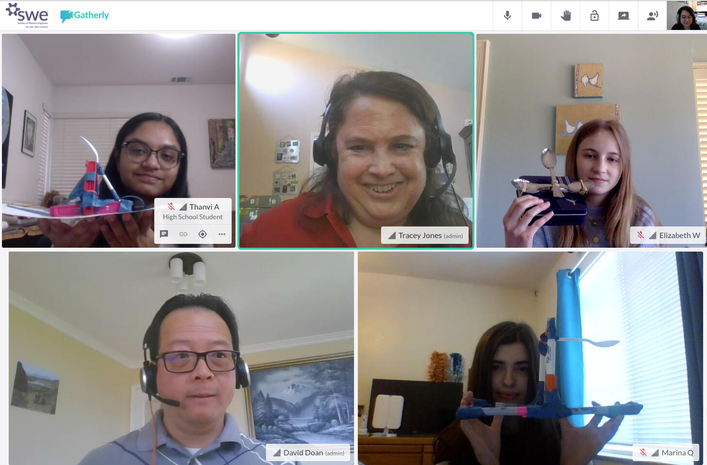 Students showing off their catapults during a workshop with volunteers from Johnson and Johnson.